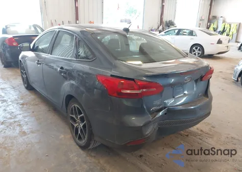 2018 Ford Focus Sel z USA, uszkodzony, nr VIN 1FADP3H23JL216225